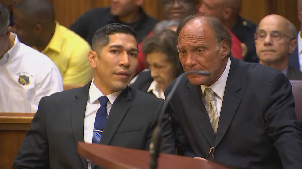 Jonathan Alleda speaks to attorney at sentencing