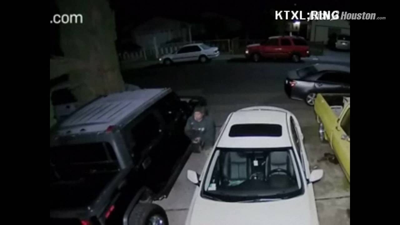 Home security camera catches man with ax smashing through Home security camera catches man with ax smashing through