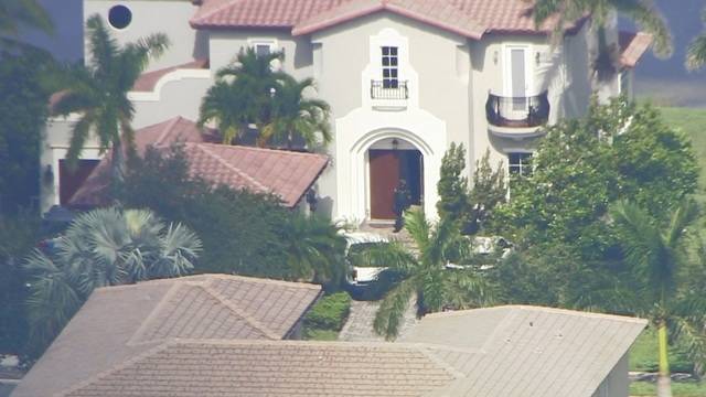 Deputies going inside David Hogg home